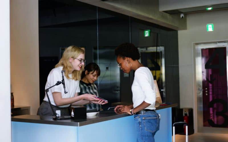 Female traveler checking -in at hotel