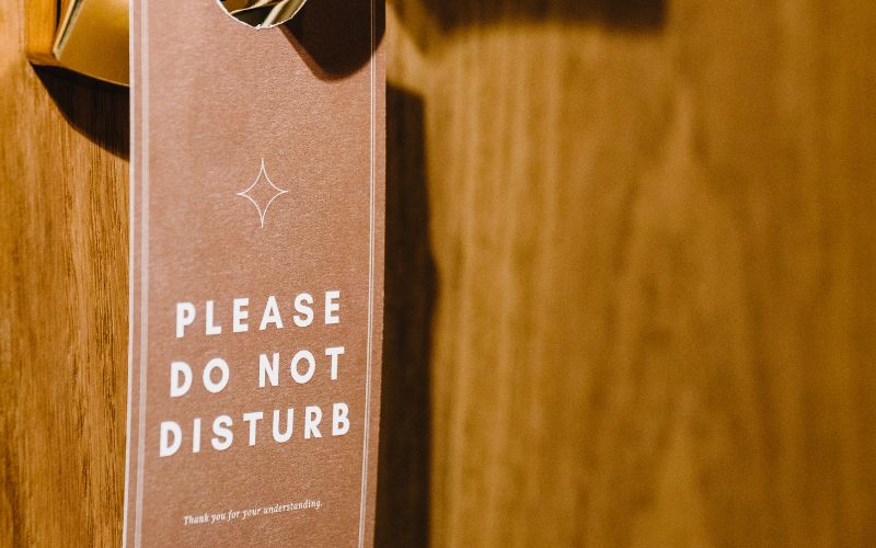 'Do not disturb' sign on hotel door