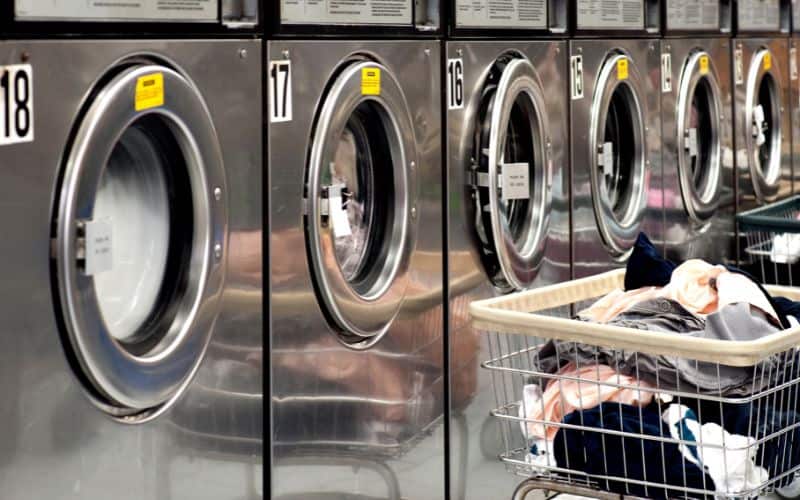 Rows of washing machines in laundromat