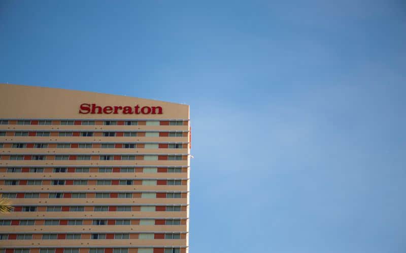 Sheraton hotel building against blue sky